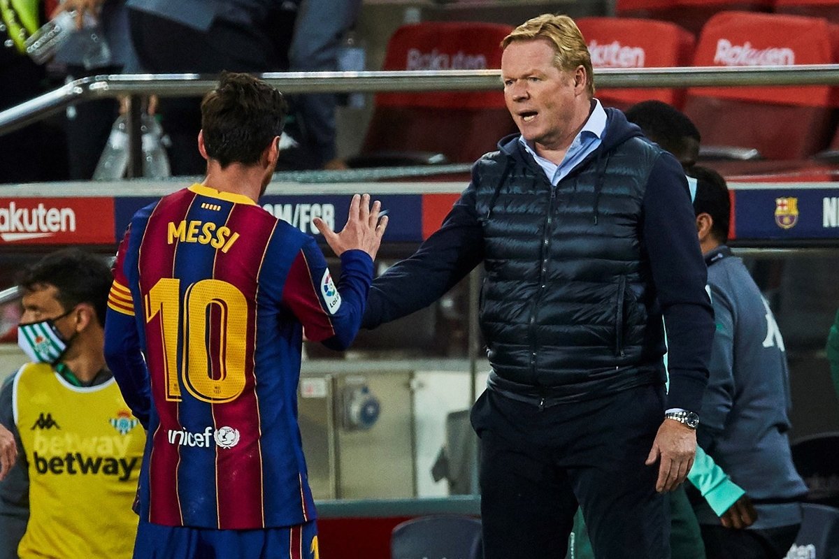 Messi y Ronald Koeman (EFE)