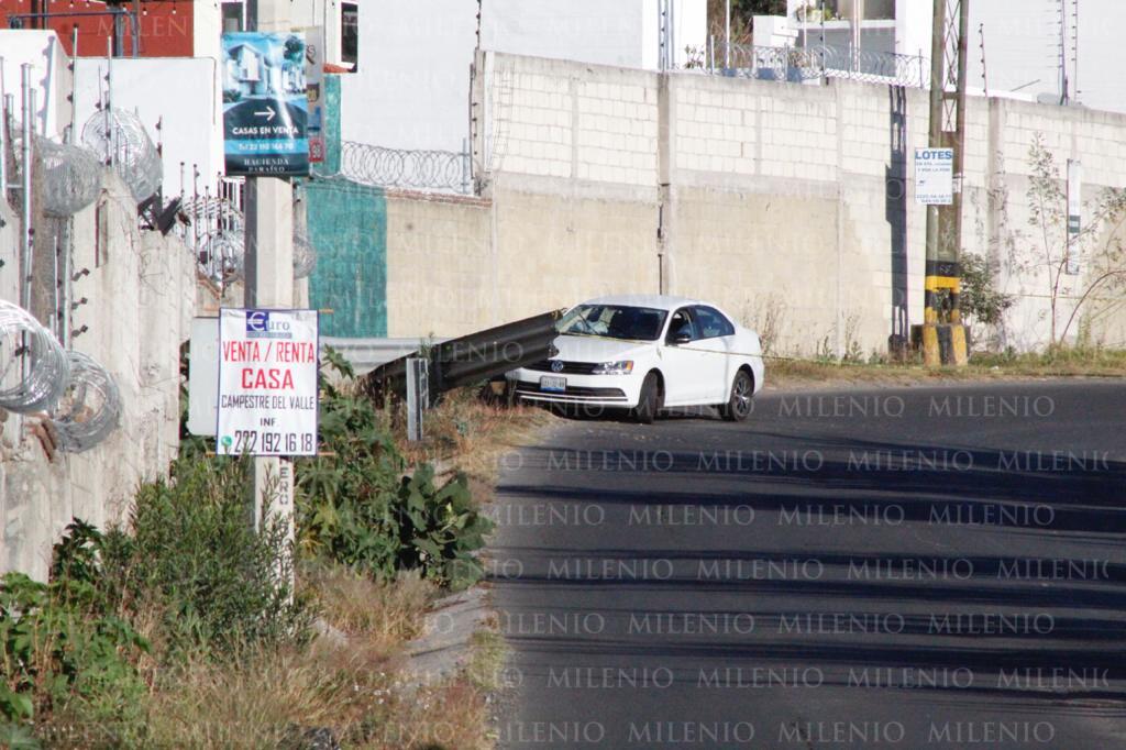 Hallan cadáver de joven dentro de su coche. (Andrés Lobato)