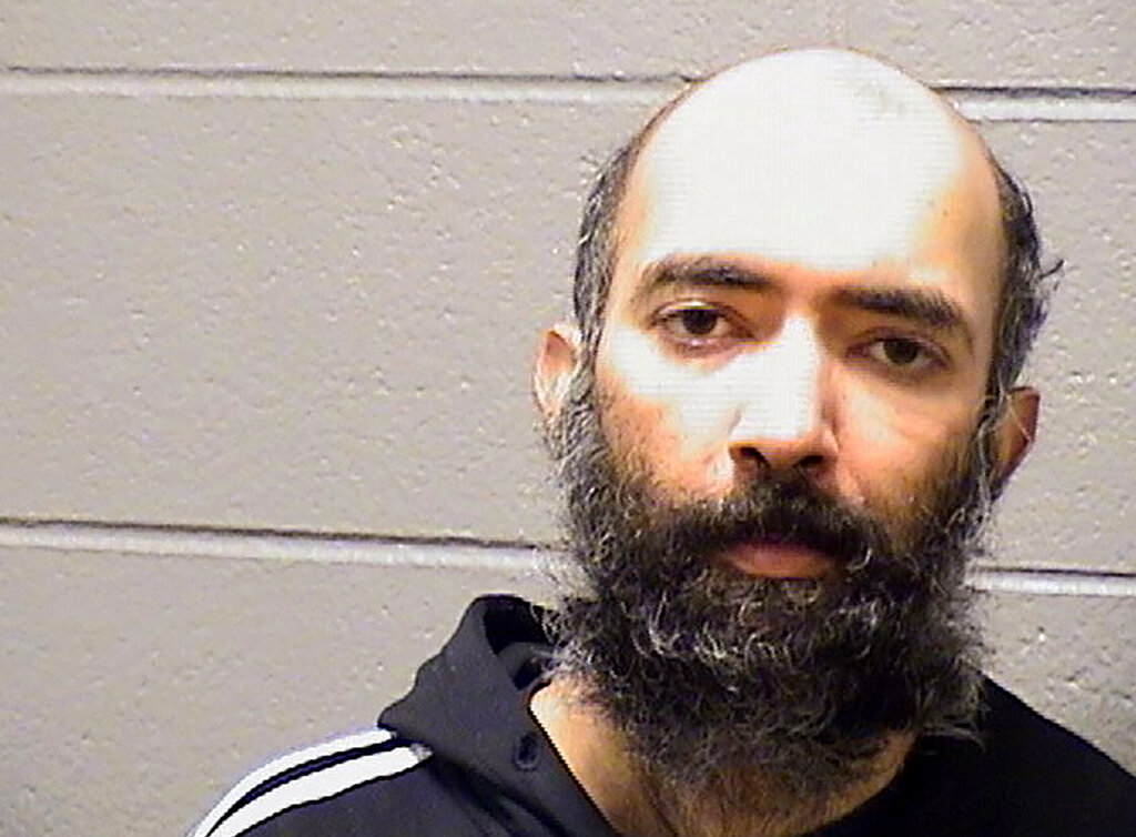 El sujeto estuvo con una credencial de un gerente del aeropuerto de Chicago. | AP