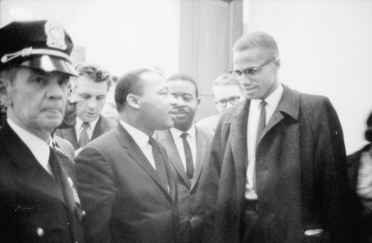 Malcolm X junto a Martin Luther King en una conferencia de prensa en 1964. (Reuters / Archivo)