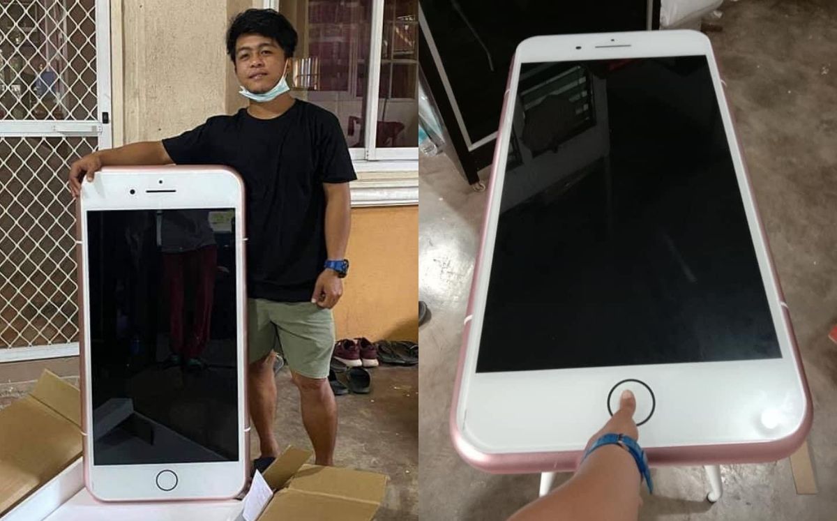 El hombre posando con su 'teléfono' (Oriental Daily)