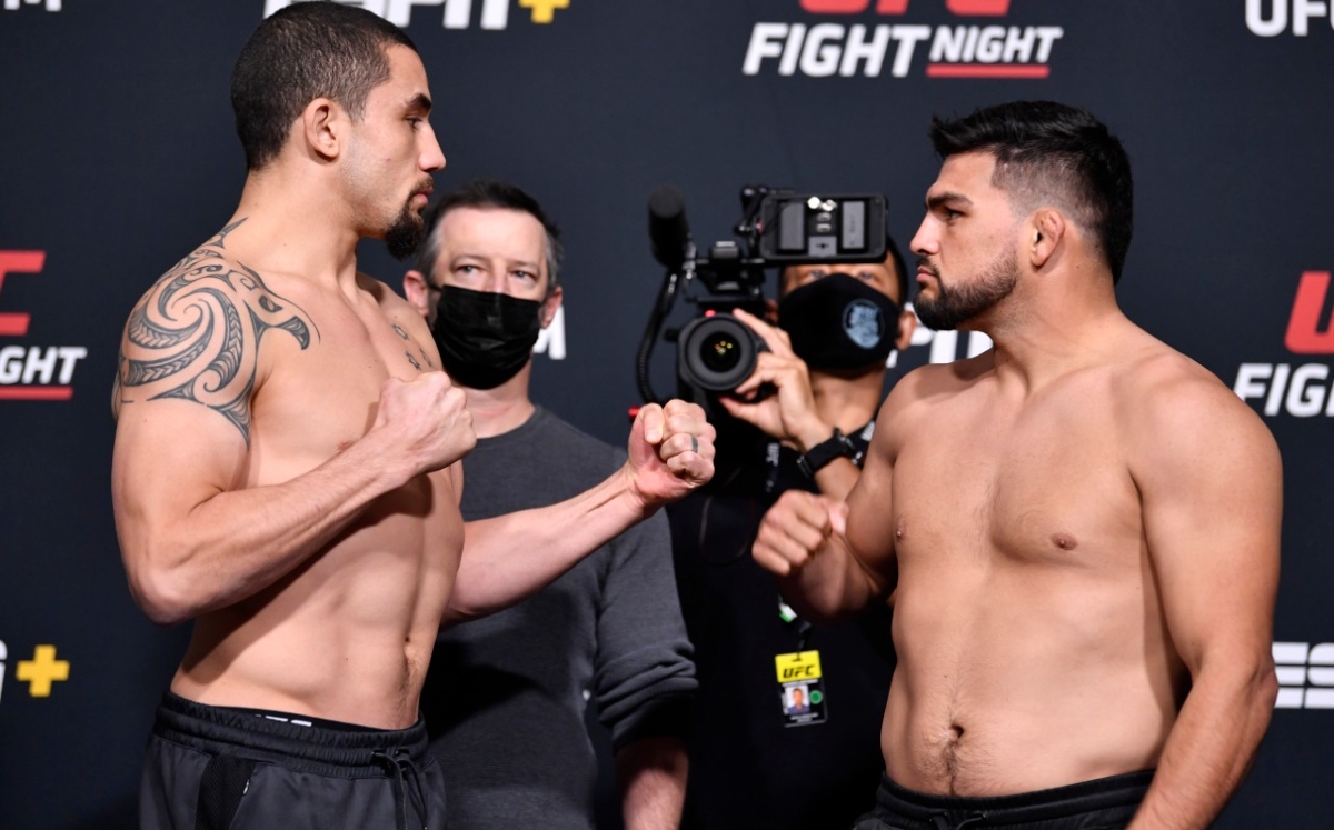 Robert Whittaker y Kelvin Gastelum (UFC)