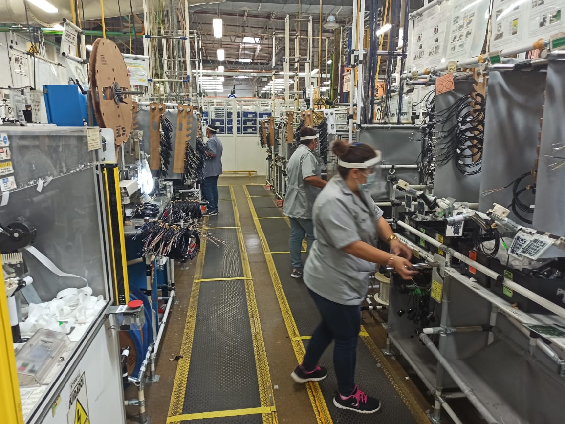 Mujeres trabajadores en maquiladoras de Tamaulipas.