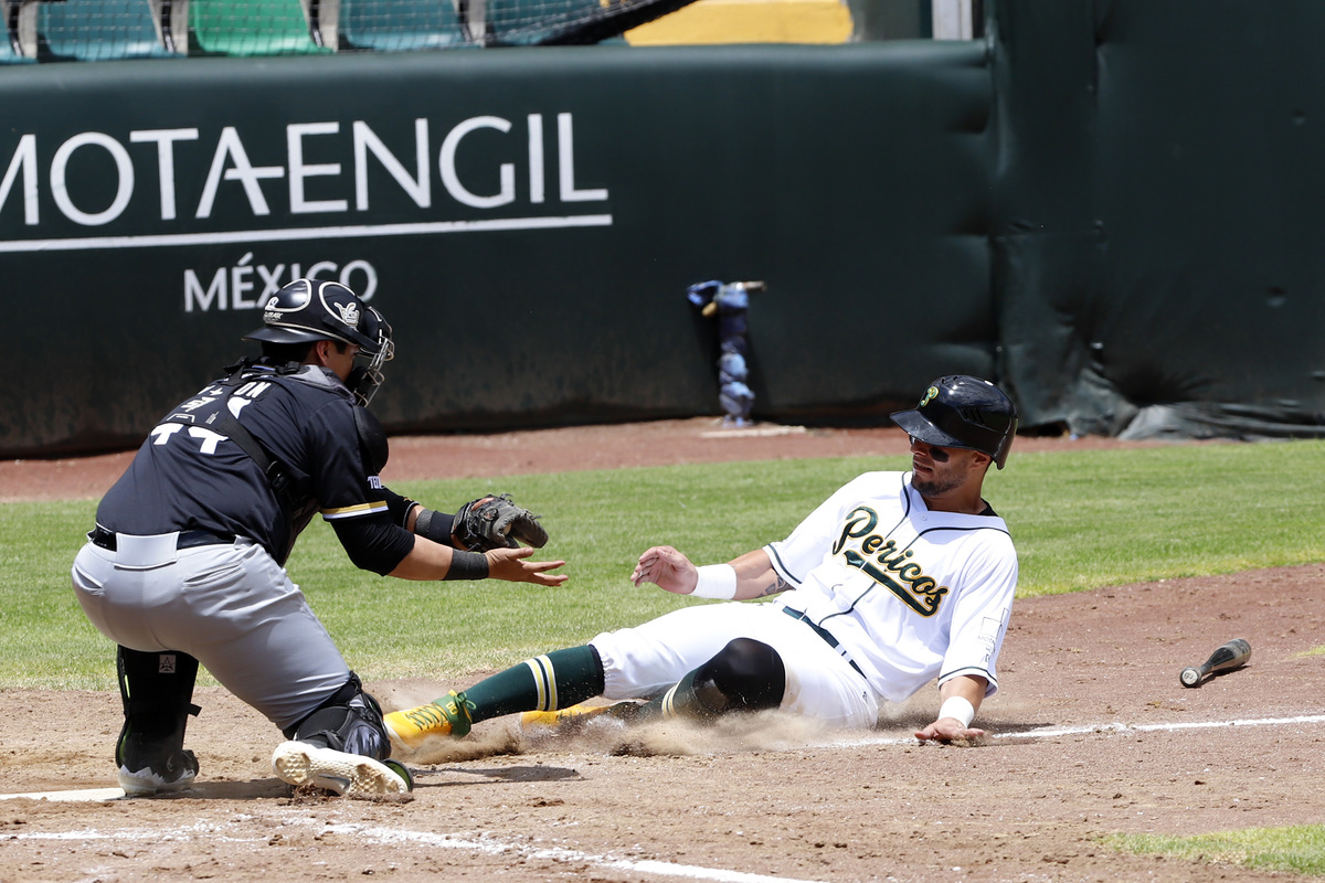 Pericos de Puebla recibe a los Guerreros de Oaxaca durante el tercer juego de la serie de la Liga Mexicana de Béisbol. (Agencia Enfoque)