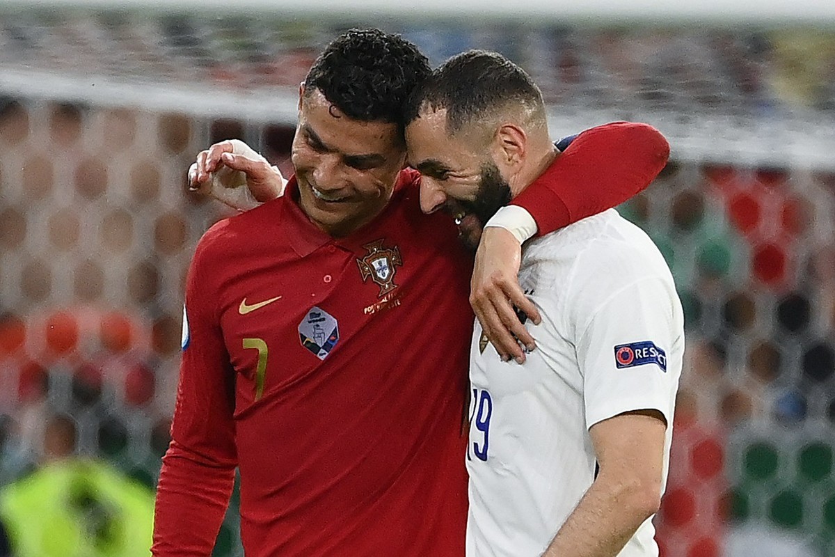 Cristiano Ronaldo y Karim Benzema (AFP)