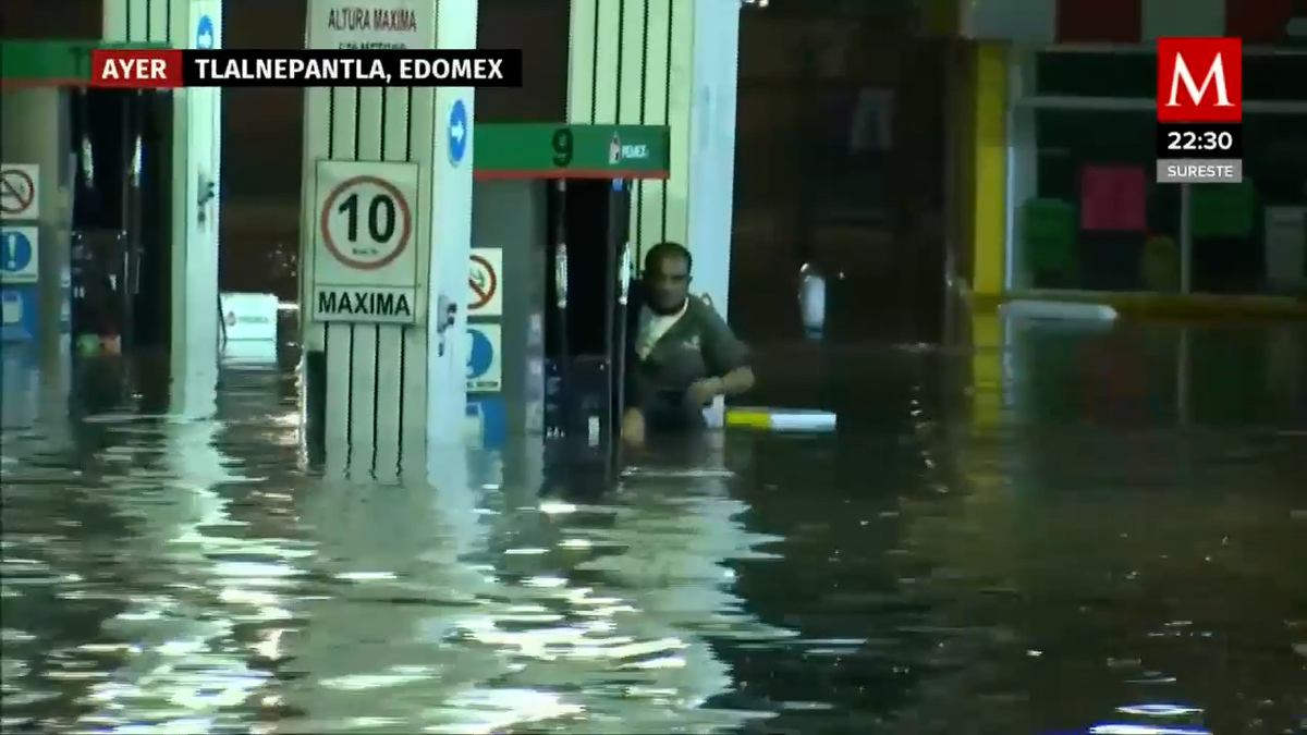 Por lluvias, empleado es atrapado 3 horas en gasolinera de Tlalne