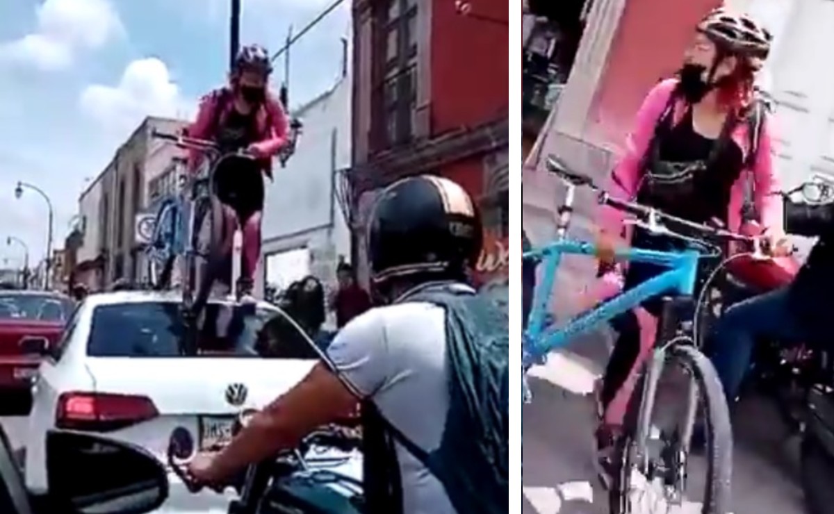 La ciclista subió al automóvil con su bicicleta y brincó sobre el vidrio. (Twitter)
