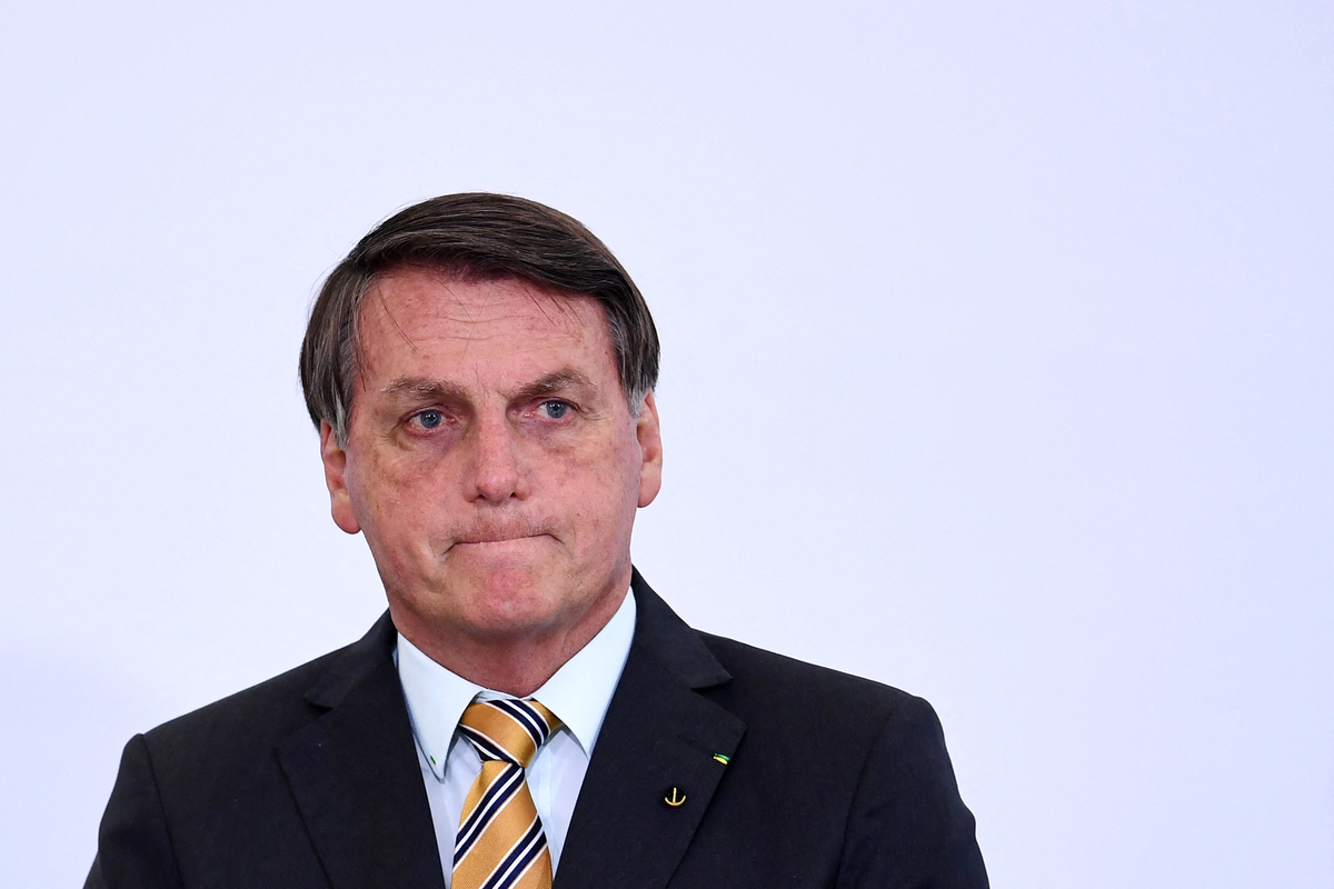 Bolsonaro se niega a responder denuncias por compra de vacunas; "me cago", dice a comisión. (AFP).