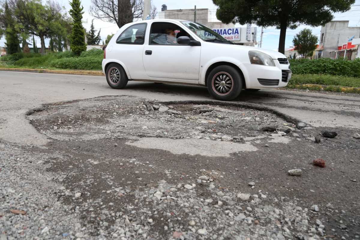 Tras lluvias, aparecen nuevos 'baches' en calles de Pachuca y Mineral de la Reforma. (Jorge Sánchez)