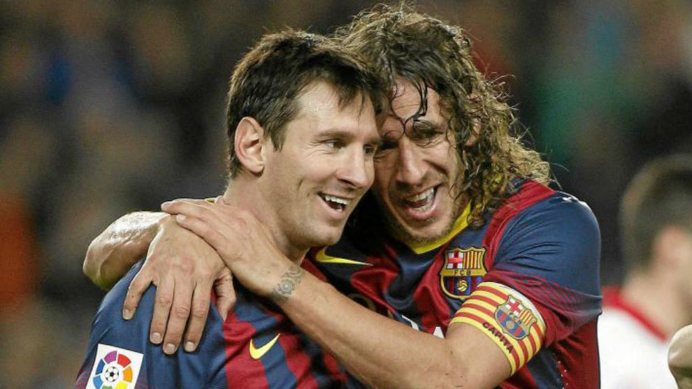 Lionel Messi y Carles Puyol (EFE)