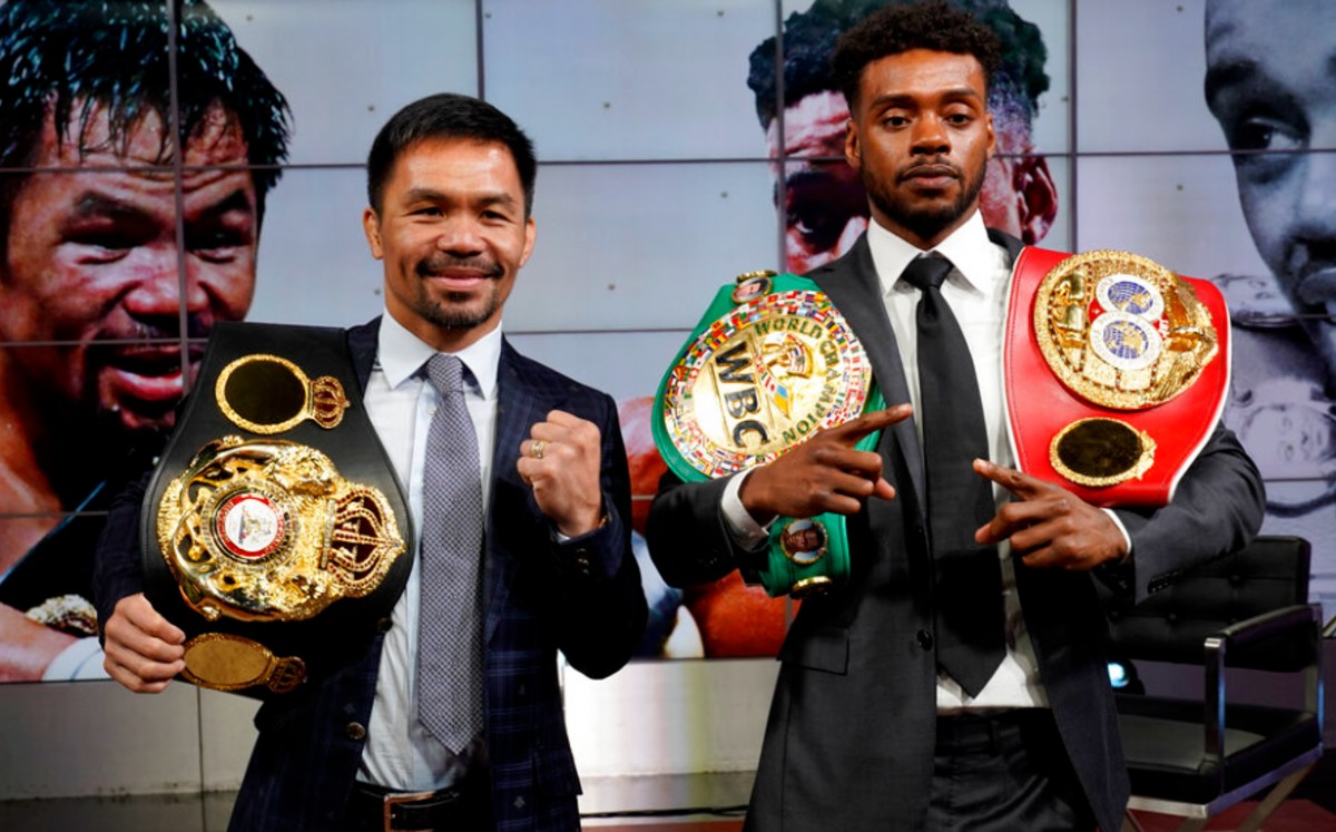 Manny Pacquiao y Errol Spence (AP)