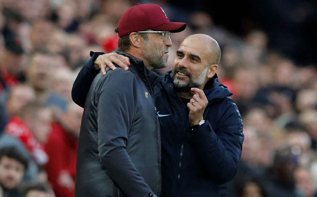 Jürgen Klopp y Pep Guardiola (Reuters)