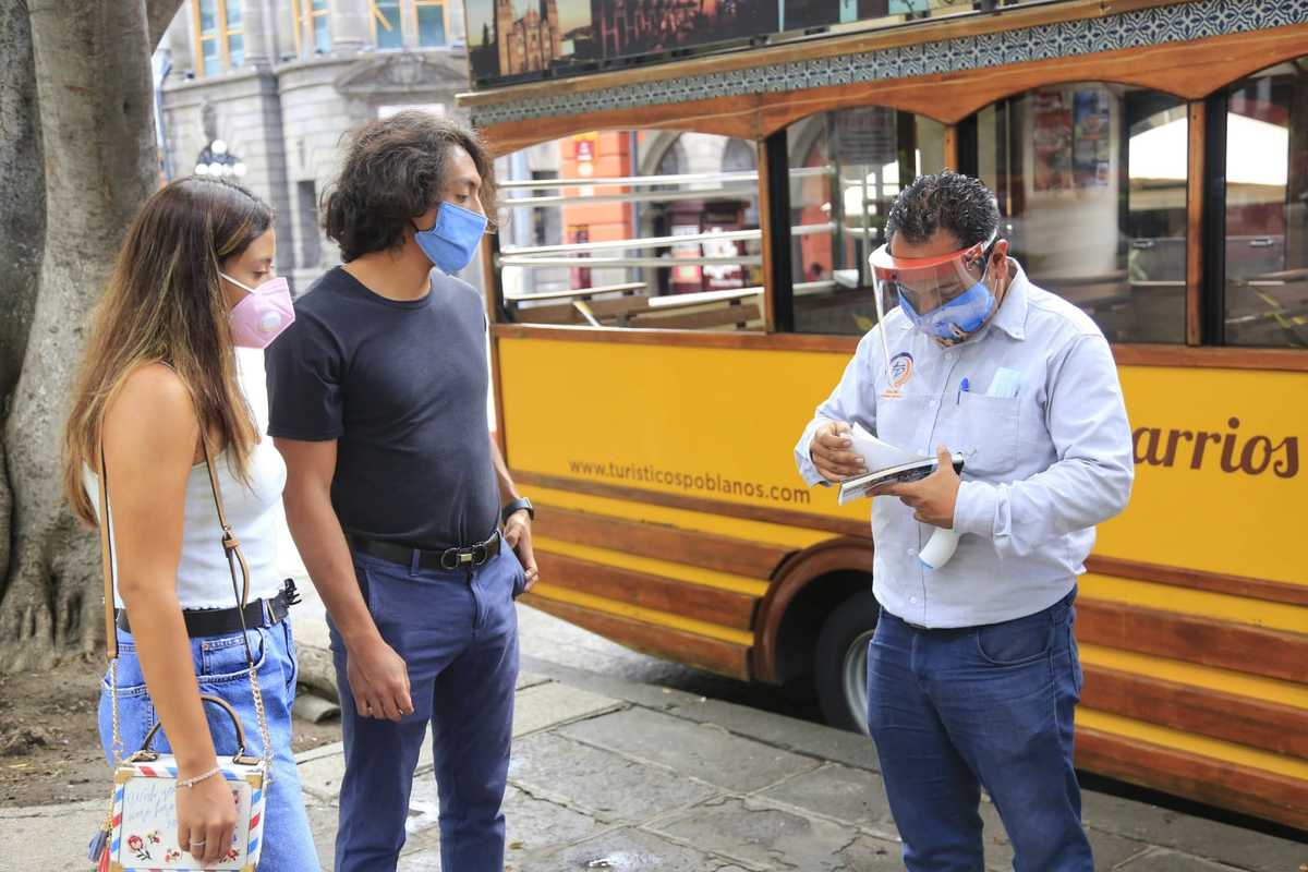 Prestadores del servicio de Turibus. (Andrés Lobato)