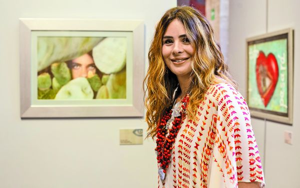 La pintora en la ceremonia de inauguración de su muestra. Jesús Quintanar