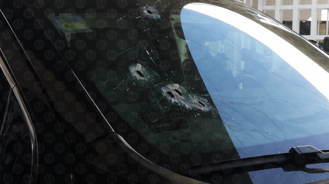 Resgistra ataque a balazos contra el conductor de una camioneta de lujo cerca del AICM | Jorge Becerril