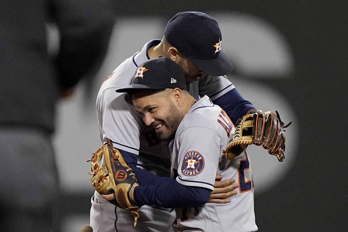 Jose Altuve y Carlos Correa de los Astros de Houston (AP)