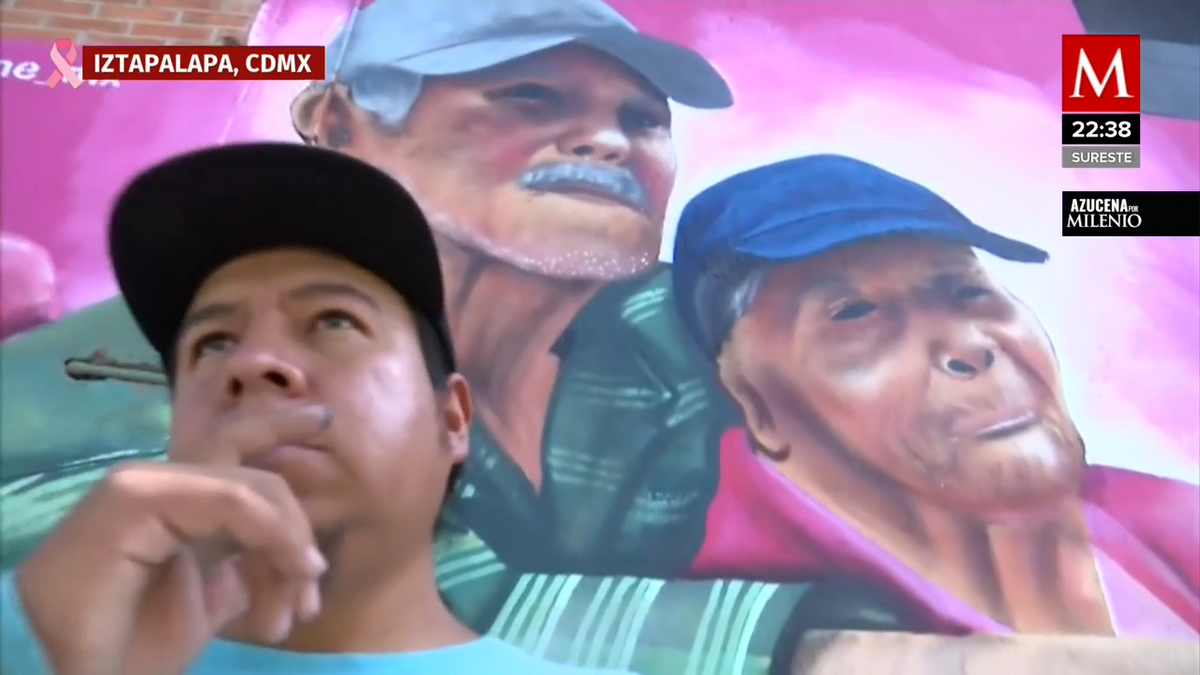 Muralista se hace famoso al plasmar en  un mural a dos personas