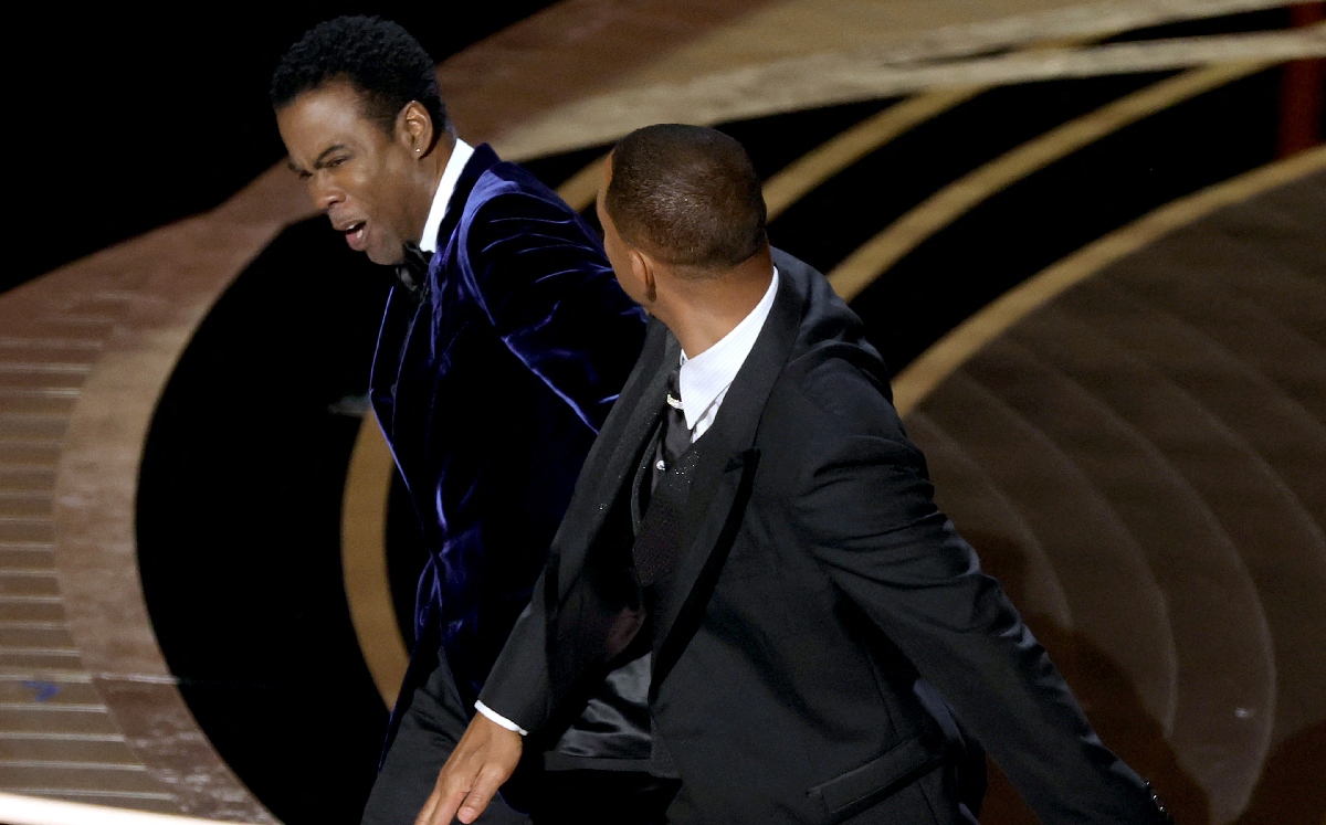 Will Smith golpea a Chris Rock (AFP)