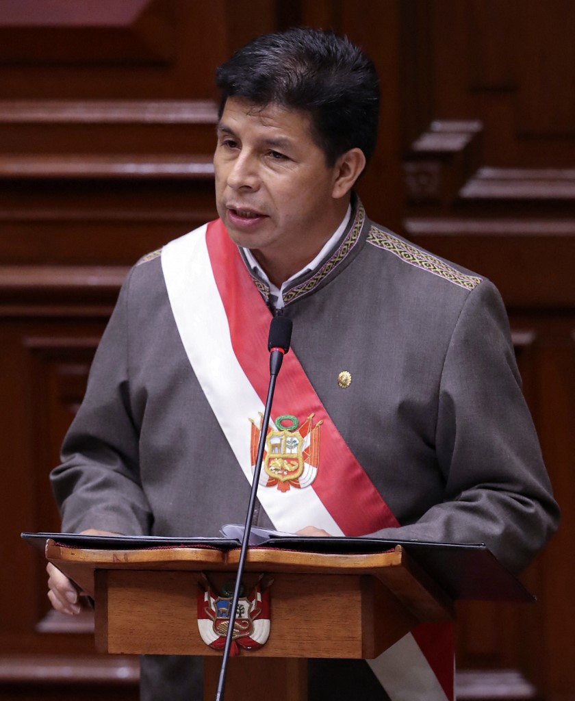 Pedro Castillo durante la discusión de su moción de vacancia en el Congreso de Perú. (AFP)