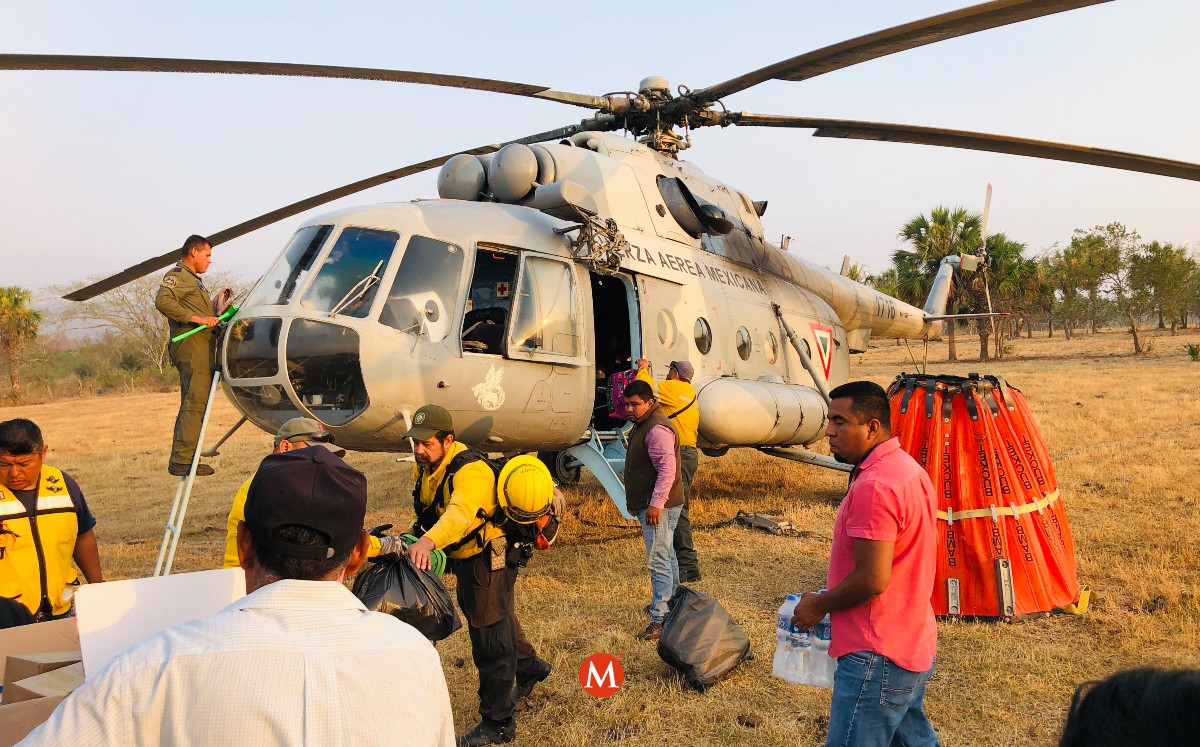 Combaten incendio en El Cielo, con cuatro helicopteros. (Cortesía)