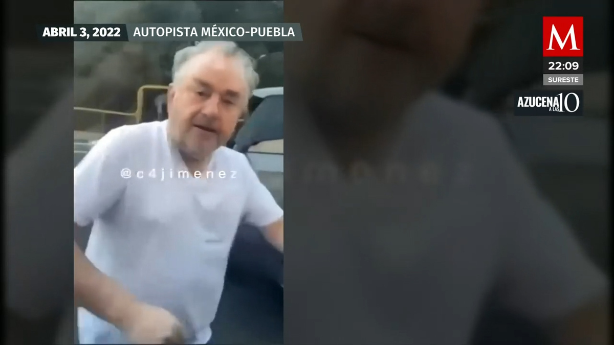 Con escoltas, empresario en Porsche choca, patea el coche y agrede al automovilista