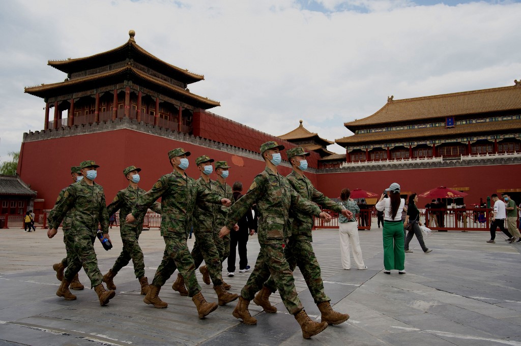 Soldados rodean Beijing en medio de medidas sanitarias. | AFP
