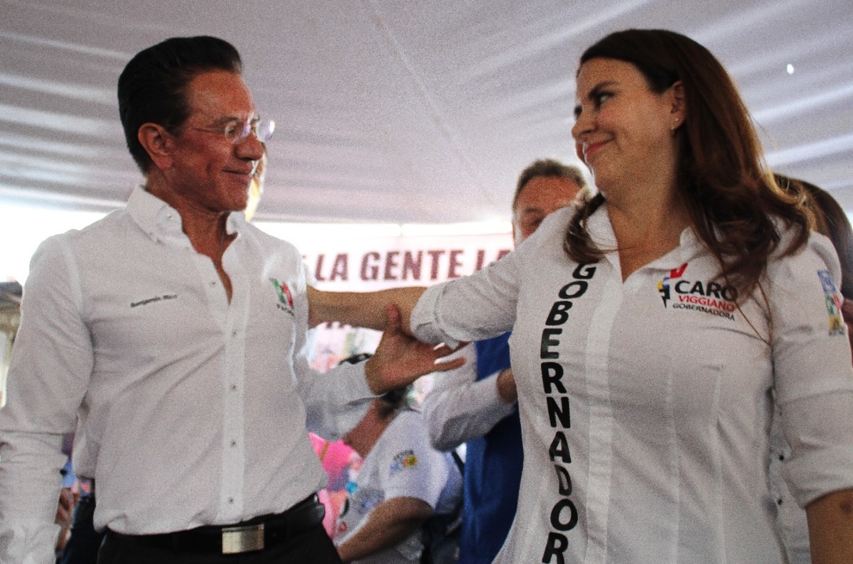 Benjamín Rico, líder del PRI municipal y la candidata a gobernadora Carolina Viggiano. (Especial)