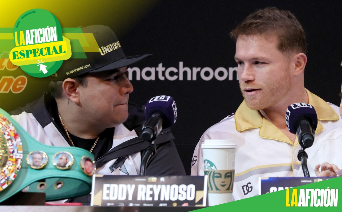 Eddy Reynoso y Canelo Álvarez (AFP)