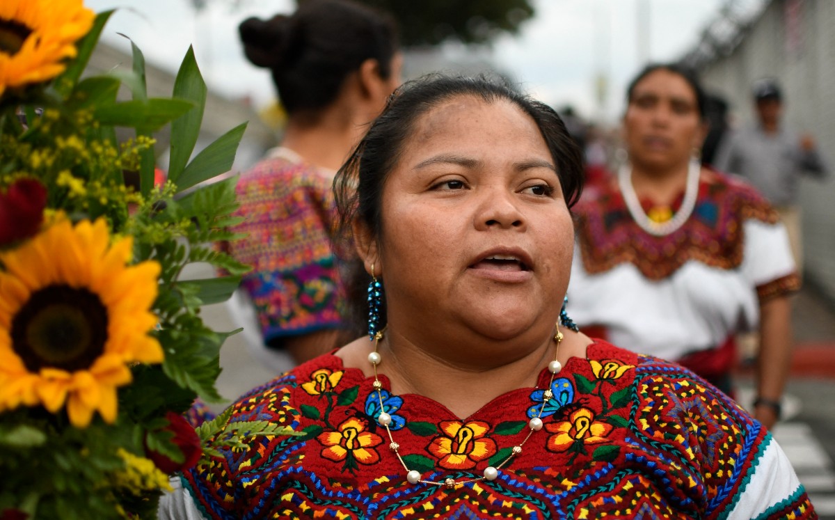 Yo soy migrante, yo no soy secuestradora", dijo Juana Alonzo. | AFP