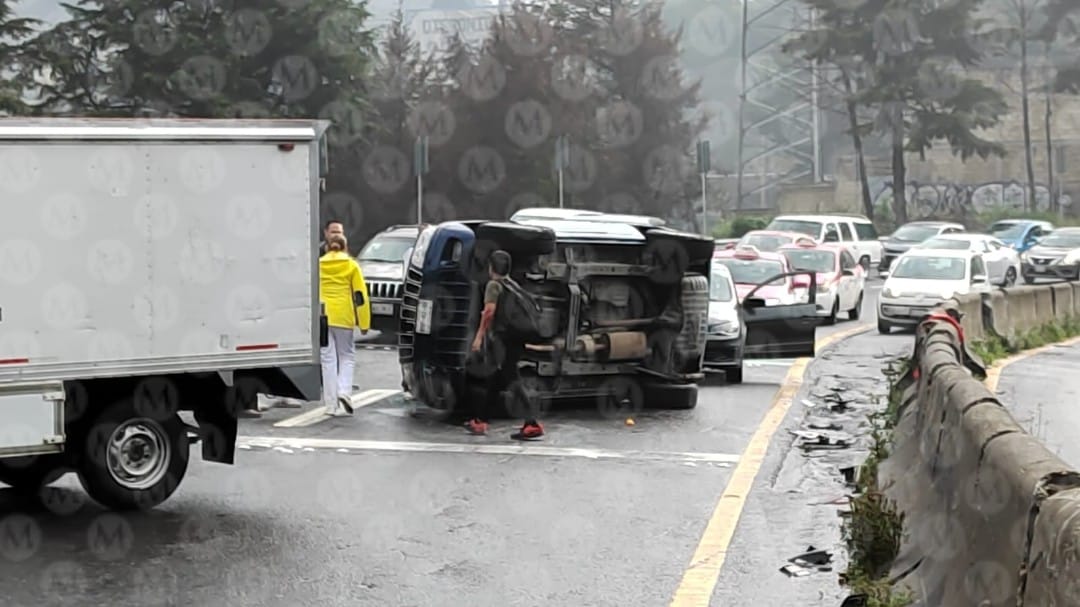 https://cdn.milenio.com/uploads/media/2022/10/04/el-vehiculo-fue-volteado-por.jpeg