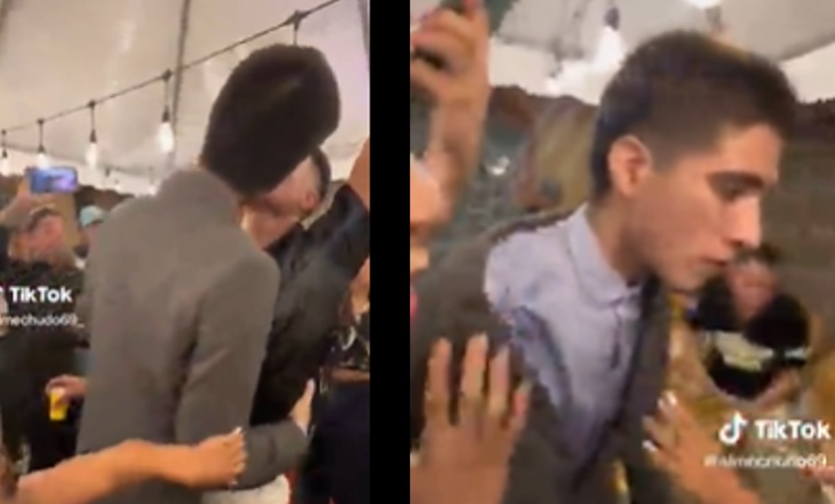 Novio es besado por invitado de fiesta en plena fiesta de su boda | ESPECIAL