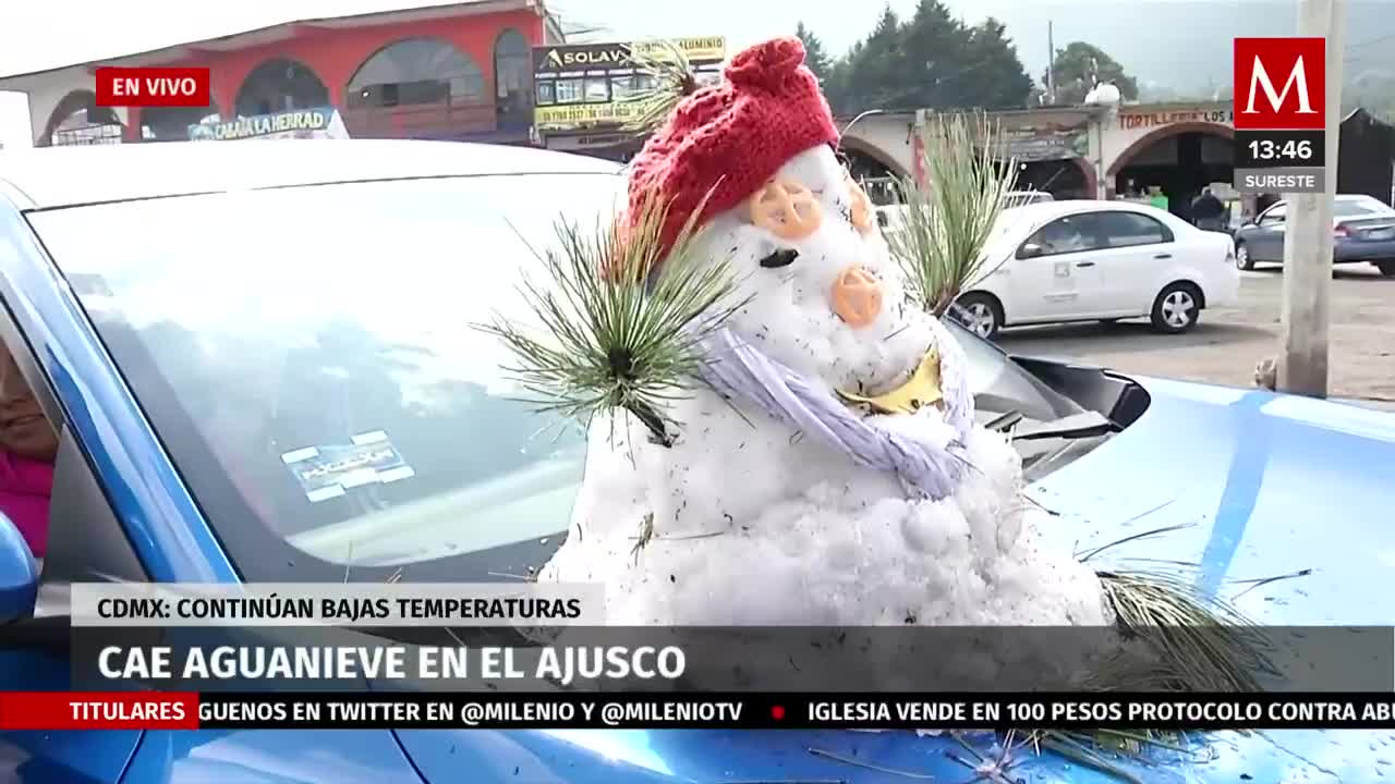 Cae aguanieve en el Ajusco, familias aprovechan y hacen muñecos de nieve