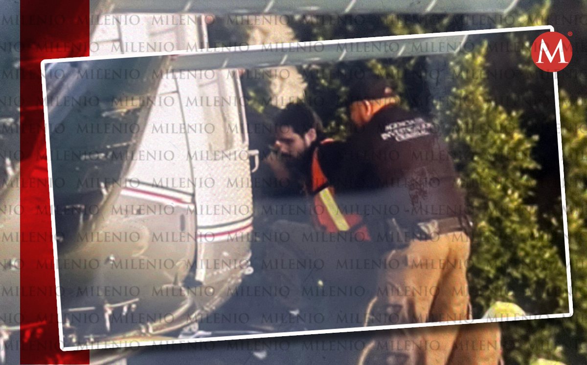 Foto de Ovidio Guzmán detenido y abordando un helicóptero. (Especial)