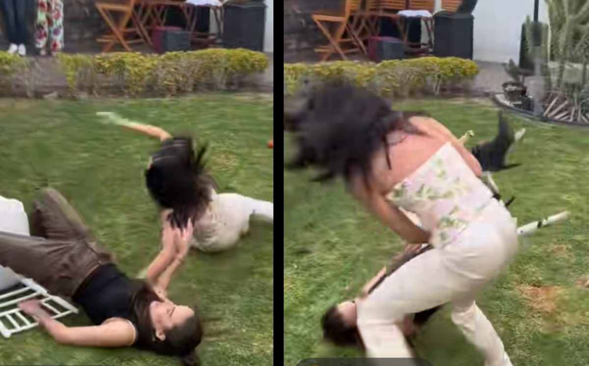 Mujeres pelean en juego de sillas. | ESPECIAL