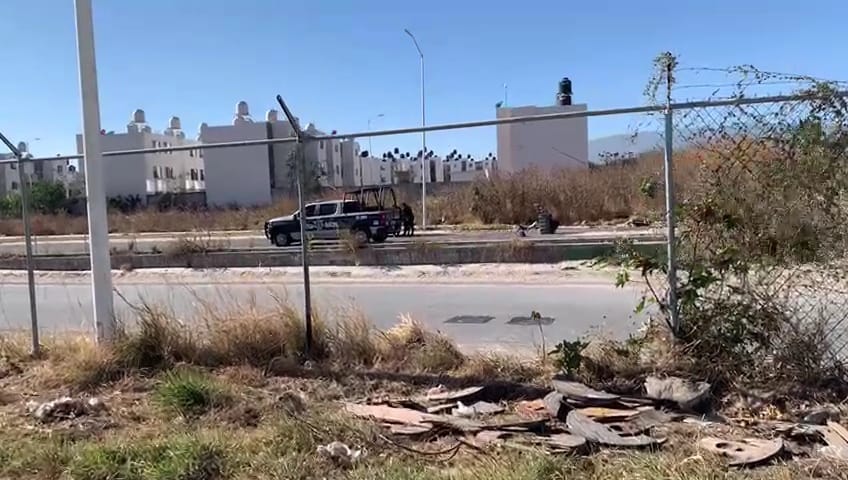 Policía vigilan lugar donde hallaron a mujer muerta en Tlajomulco (Juan Carlos Munguía)