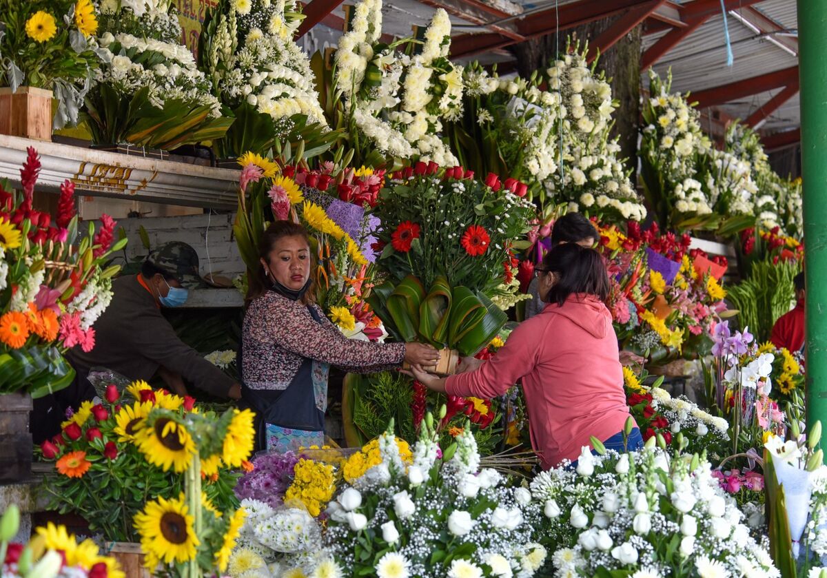 Vendedores de flores. | Cuartoscuro