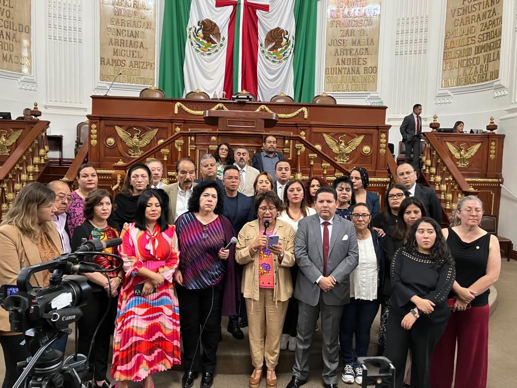 Con 34 votos a favor, uno en contra y otra abstención.