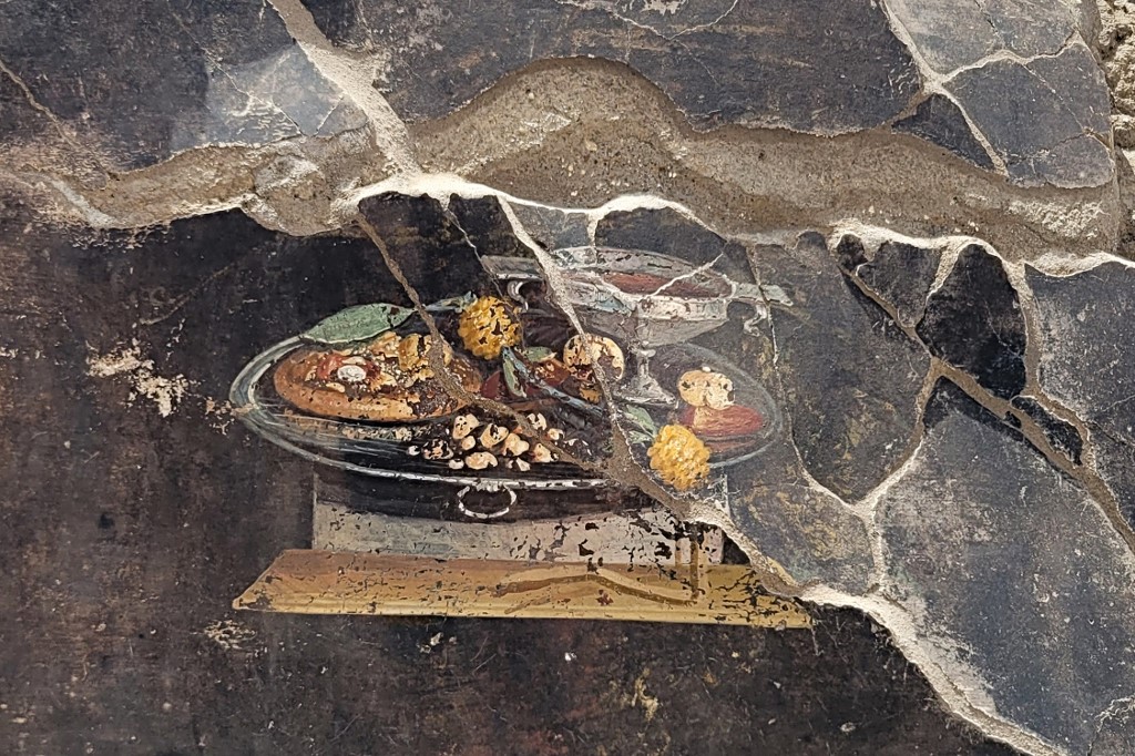 Pintura encontrada en Pompeya / AFP