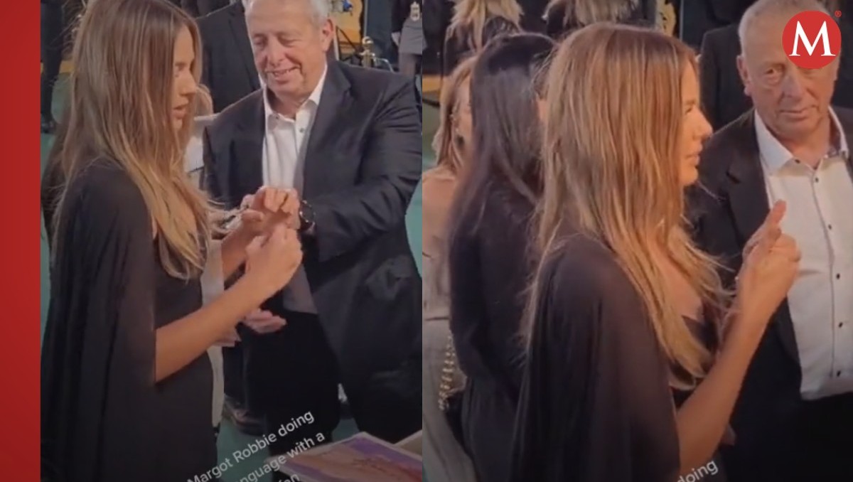 Margot Robbie hablando con lenguaje de señas | Captura