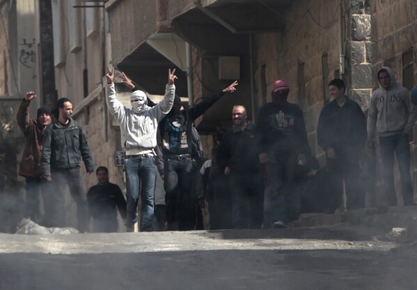 Manifestantes en el sur de Siria toman oficinas y calles en protestas por la economía