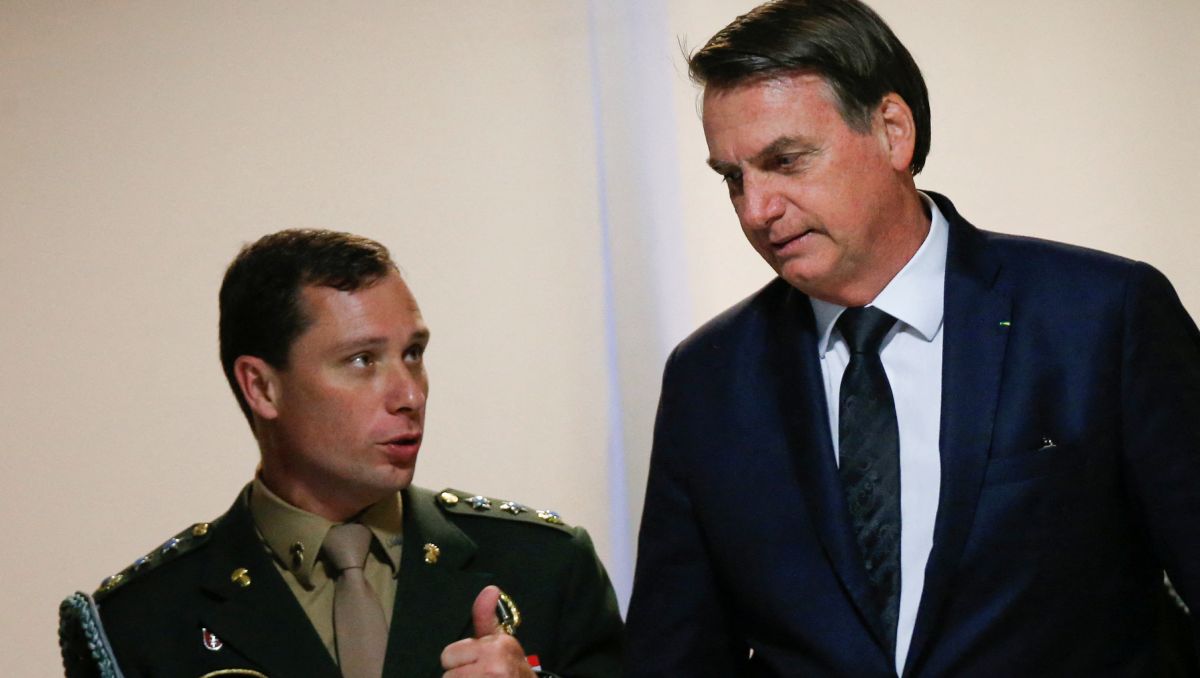 Mauro Cid junto a Jair Bolsonaro | Reuters