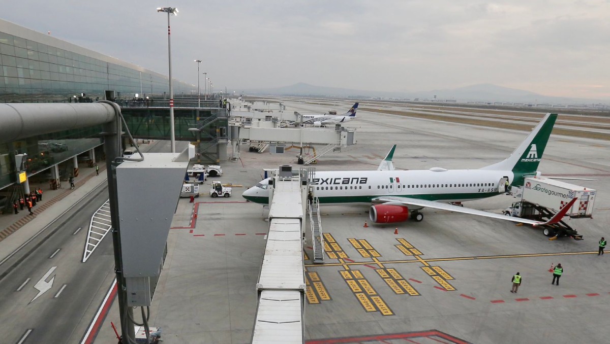 Aspectos del primer vuelo comercial 1788 de Mexicana de Aviación con destino a Tulúm. Fotos: (Ariel Ojeda)
