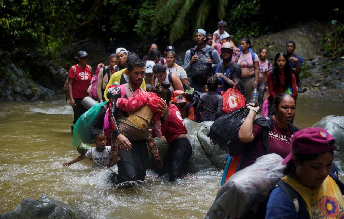 Migrantes venezolanos en el Darién (Reuters)