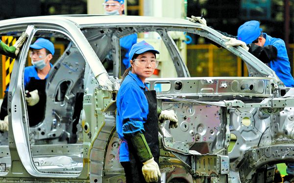 Las automotrices son de los grupos más beneficiados. BOBBY YIP/REUTERS