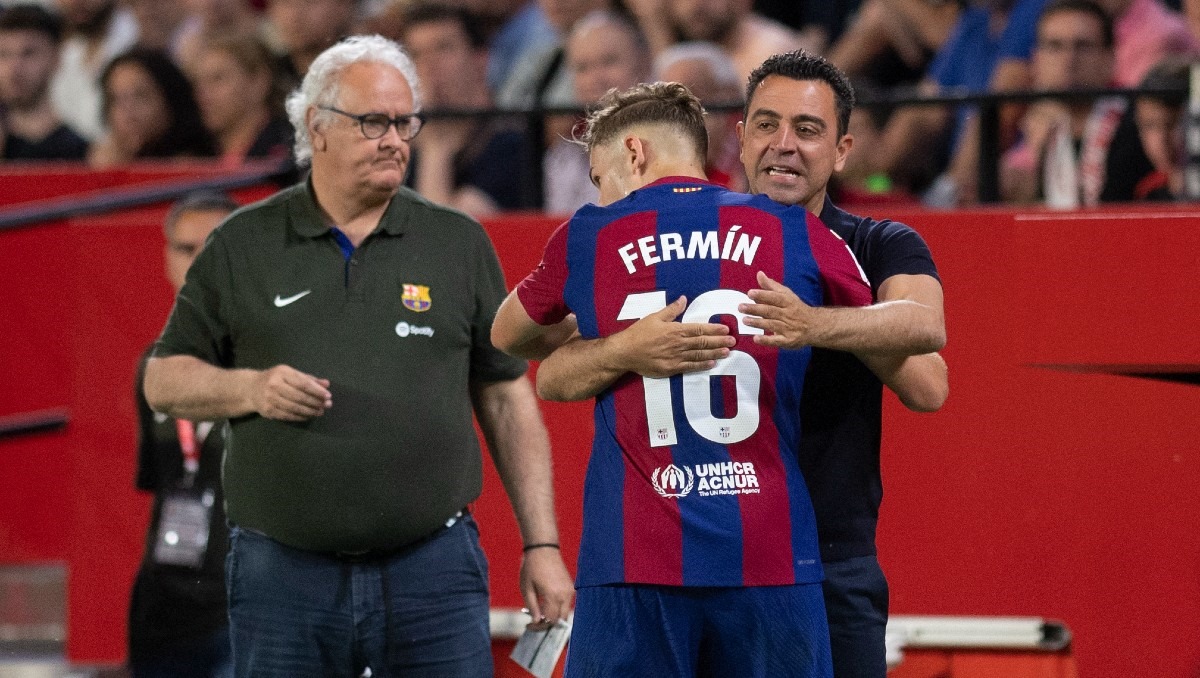Barcelona le dice "adiós" a Xavi con victoria sobre Sevilla (AFP)