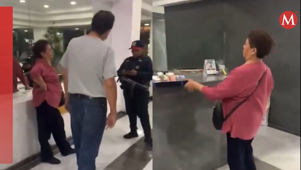 La mujer fue captada tomando fotografías a las credenciales | Captura