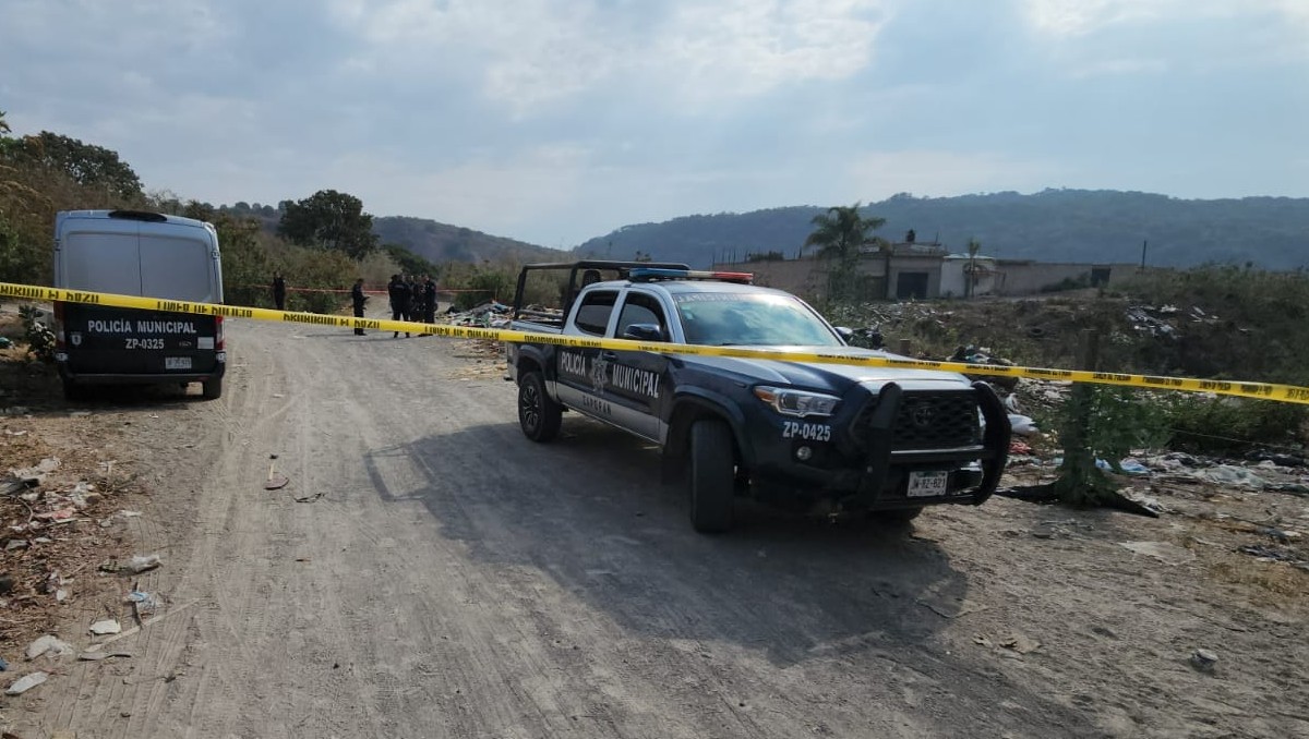 Policías de Zapopan vigilan lugar de asesinato de una mujer (Juan Carlos Munguía)