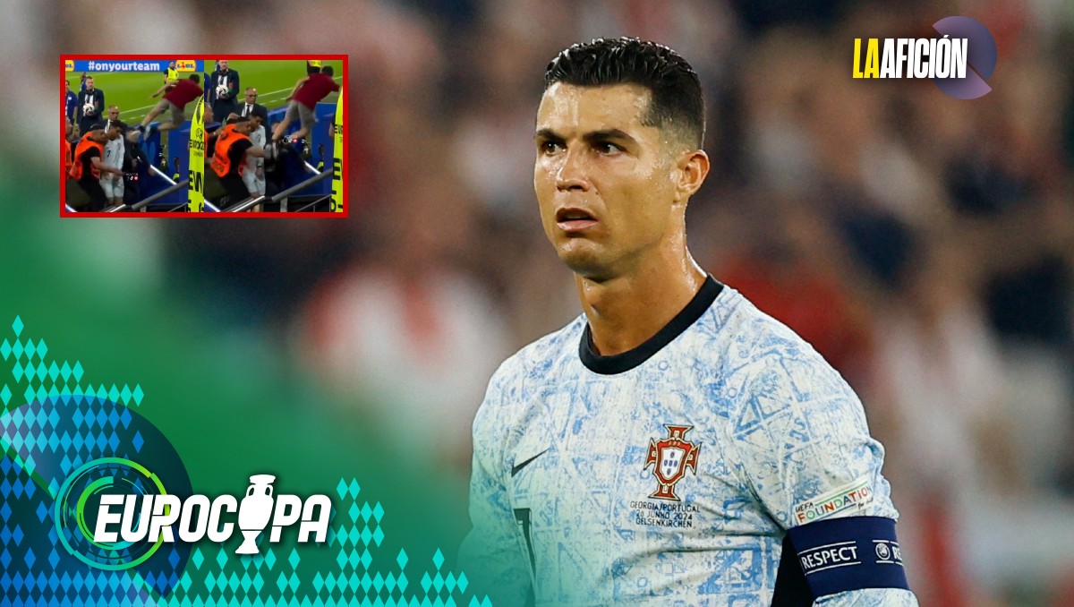 Aficionado estuvo cerca de caer sobre Cristiano Ronaldo tras saltar desde las gradas (Reuters/Especial)