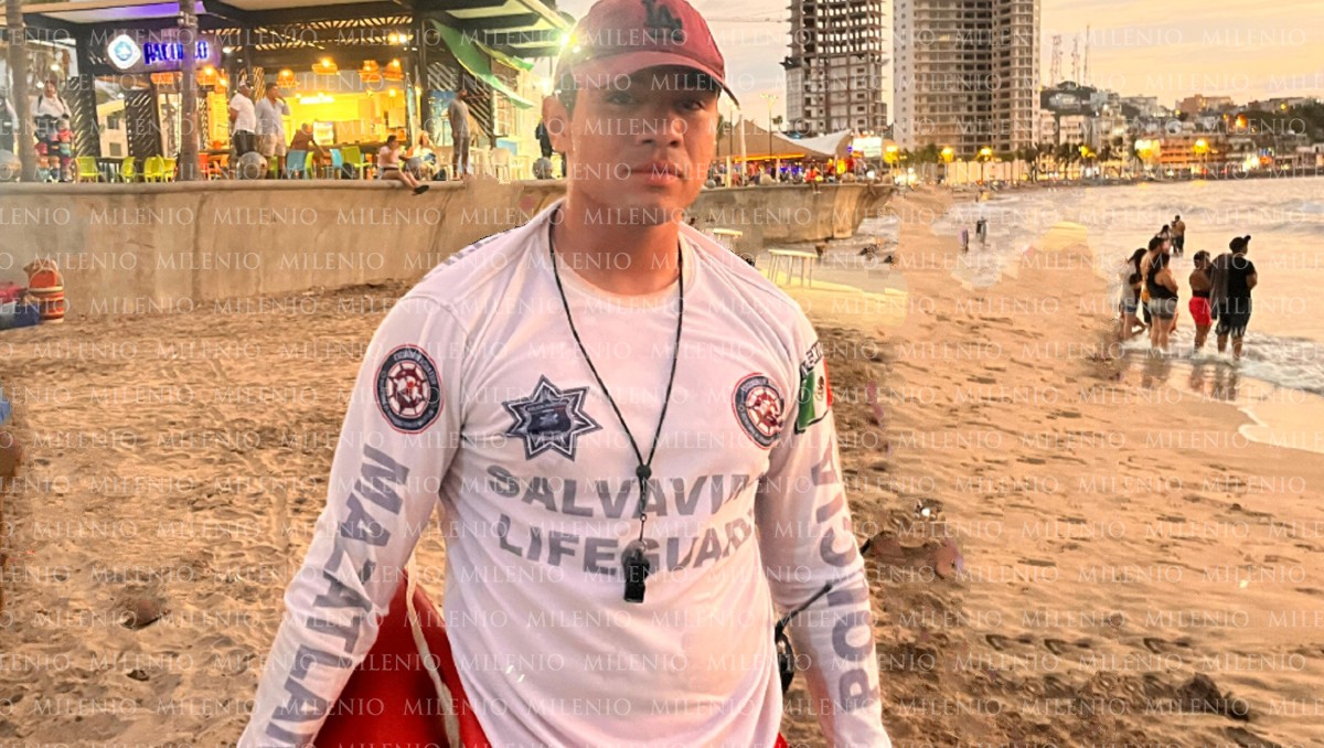Salvavidas rescata a joven atrapado por corrientes marinas | Especial | Foto editada con IA