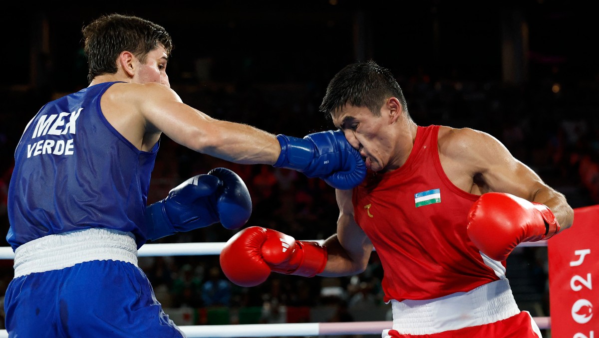 Marco Verde enfrentó a Asadkhuja Muydinkhujaev en la final de boxeo (Reuters)